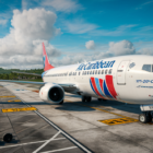 discover the captivating story of the delivery of air caribbean's boeing 737-2q8 9y-tjg, which took off from trinidad and tobago on march 5, 1999. delve into the details of this landmark aviation event.